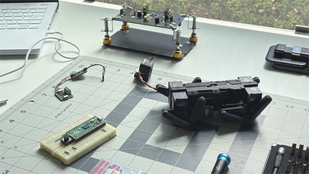 Q8botOne and controller electronics on a workbench