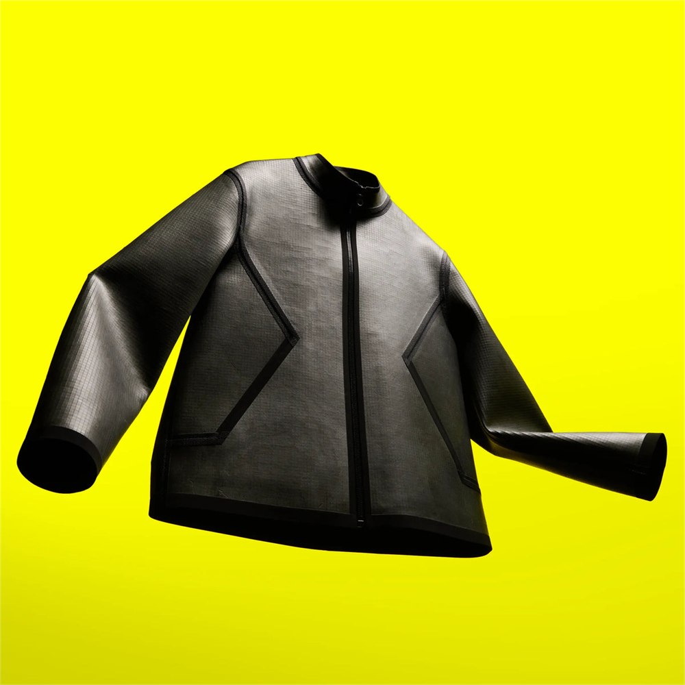 Full view of the slate jacket with black taped seams against yellow