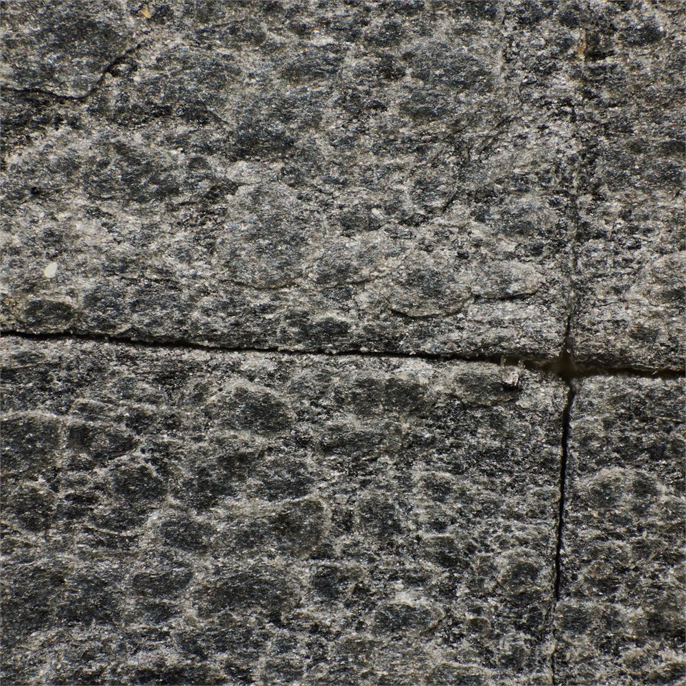Macro photograph of the natural slate surface and tile boundaries