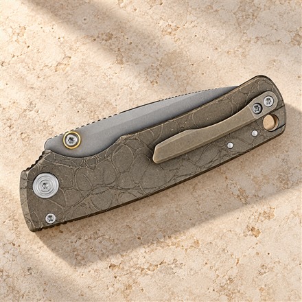 This Slim Titanium Pocket Knife Packs a Working Blade Into an 8 mm Handle