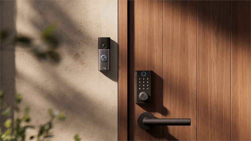Ring smart lock on a door beside a separate doorbell