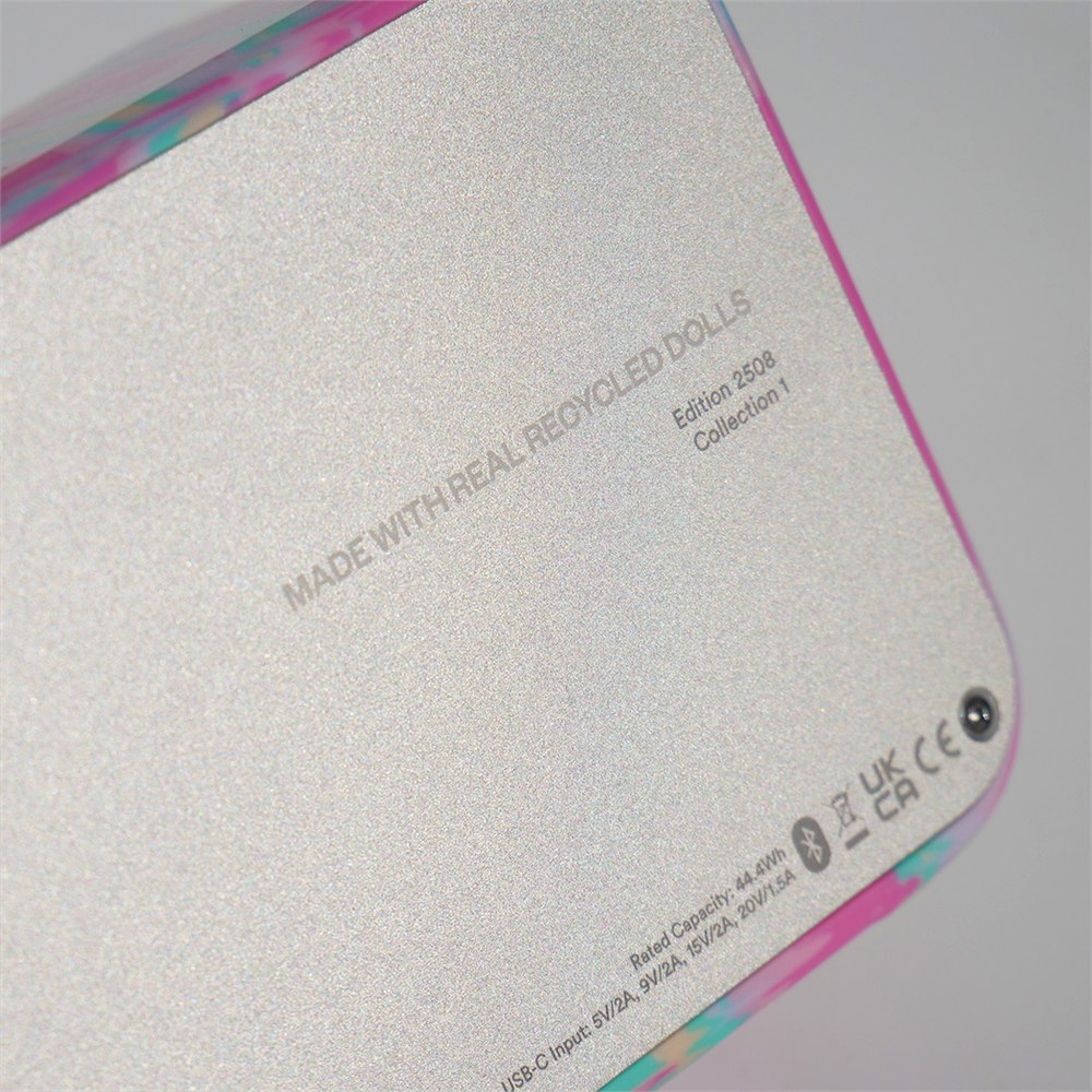 Close view of the aluminum speaker back with recycled-doll material marking
