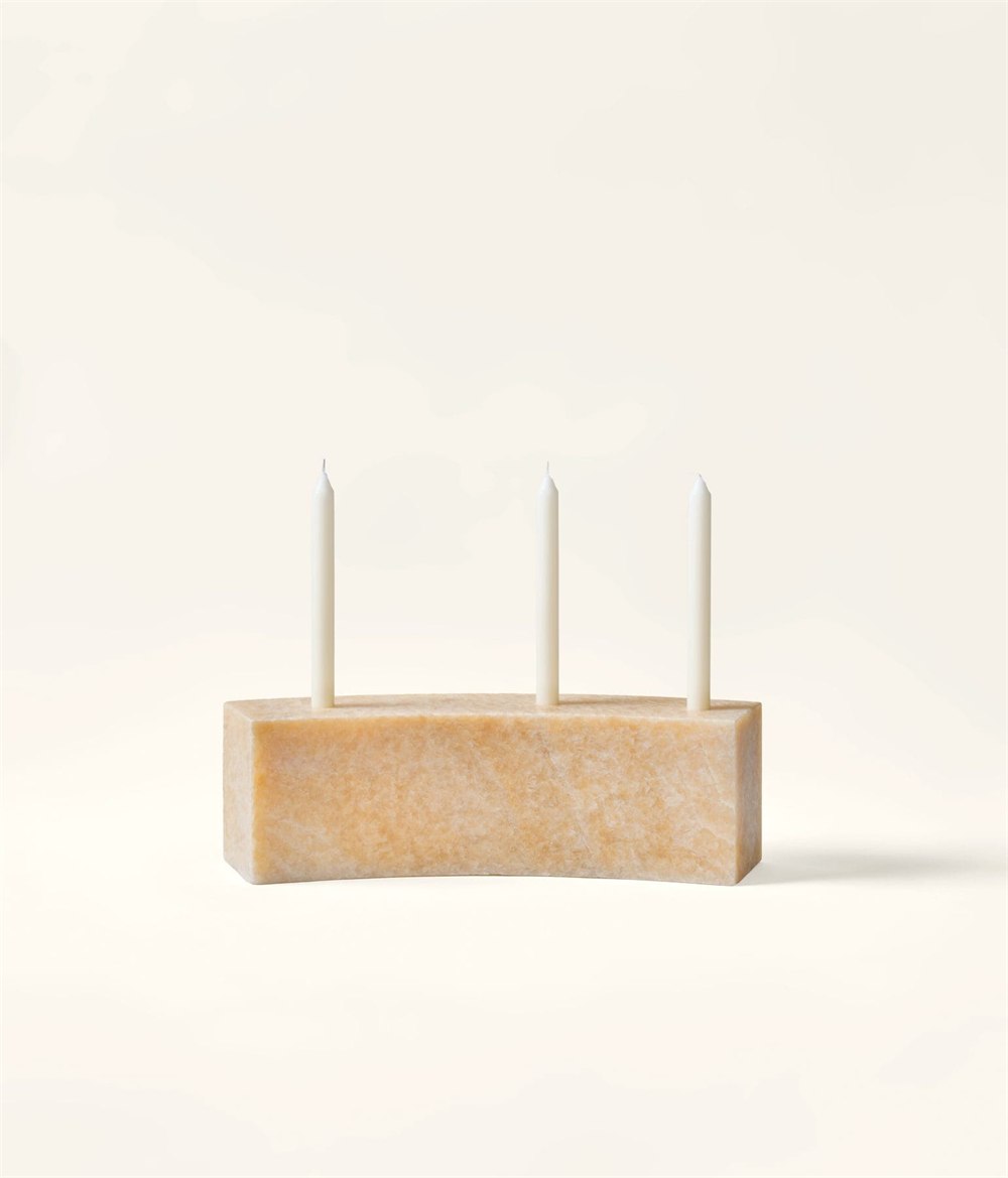 Small Honey Onyx candleholder with three dinner candles