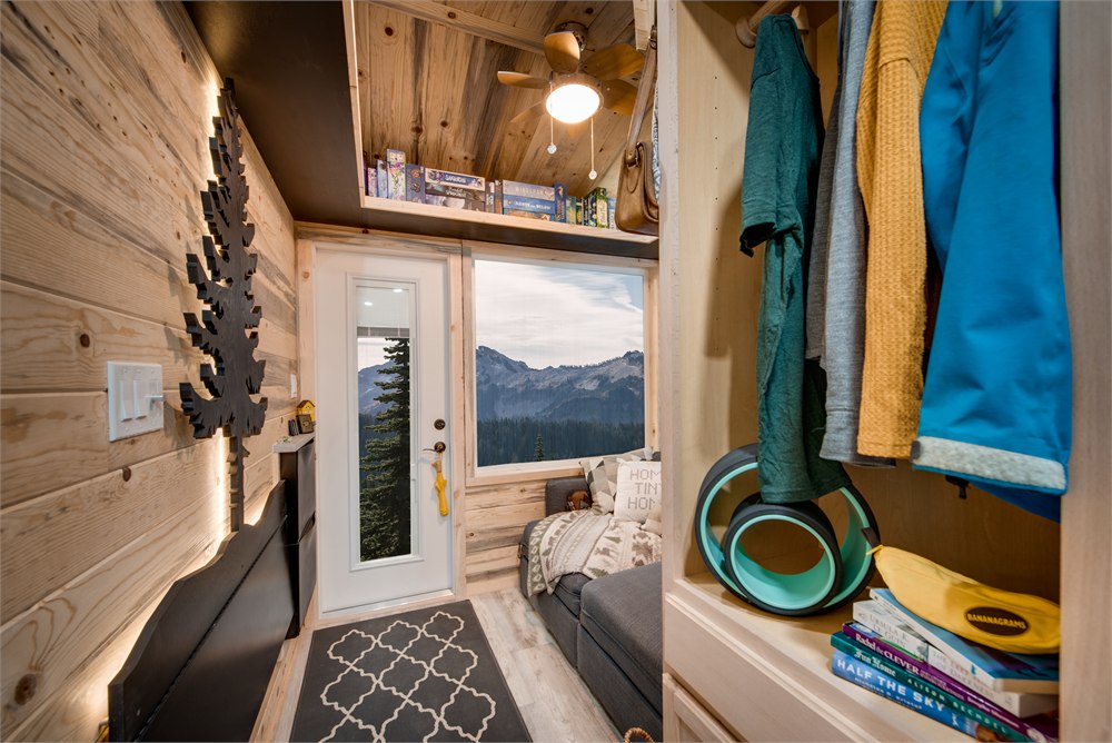 Wardrobe and entry area inside The Traveler tiny home