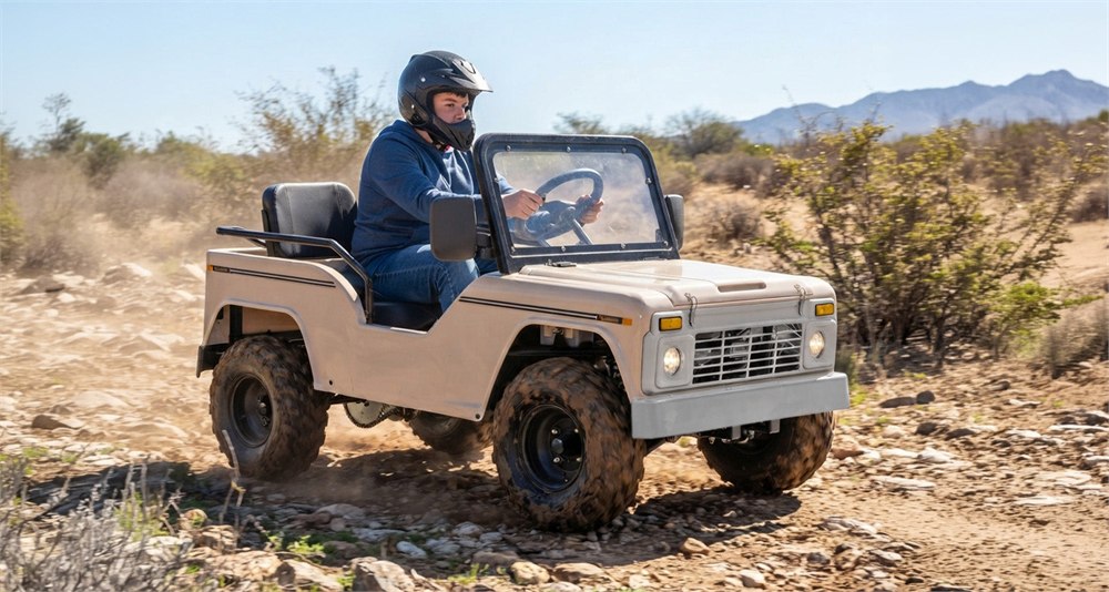Massimo Mini Truck go-kart with a helmeted rider on an off-road trail