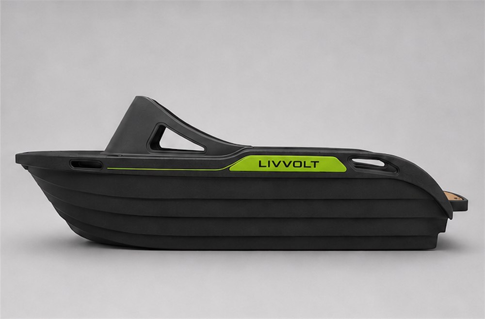 Side profile showing the compact low hull and carrying handles