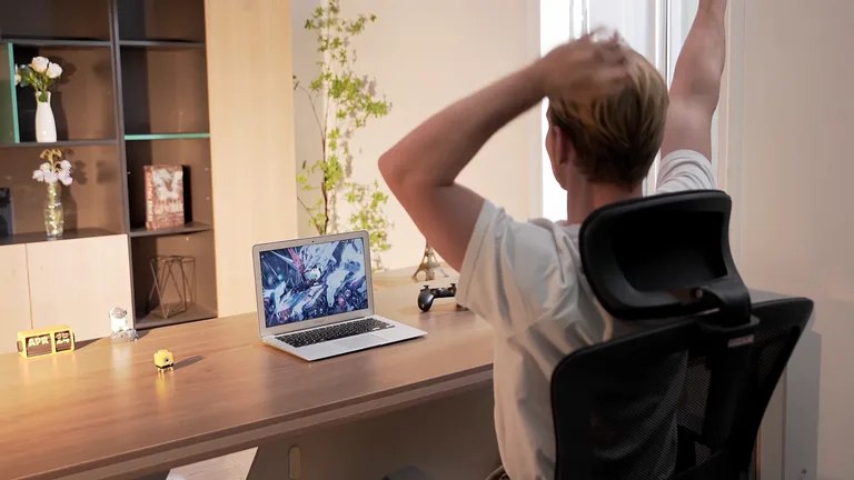 StepTimer beside a laptop during a desk break