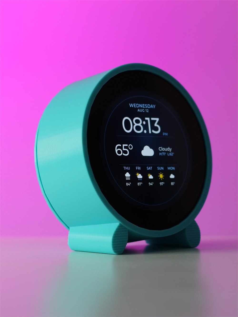 Teal Classic clock displaying time and a multi-day forecast