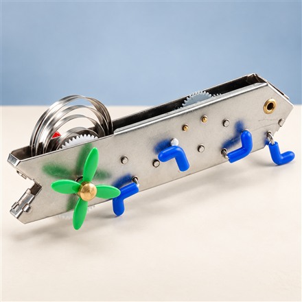 This Wind-Up Climbing Toy Crawls Over Small Obstacles on Your Desk