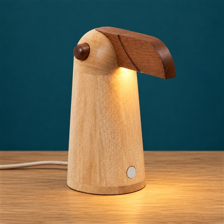 This Wooden Bird Table Lamp Hides a Warm Light Under Its Beak